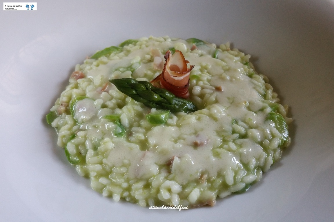 Risotto agli asparagi crema di parmigiano e speck