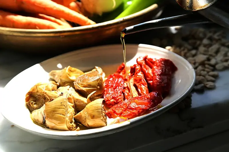 Ricette Carciofini e pomodori secchi aperitivo le masserie del duca guarini